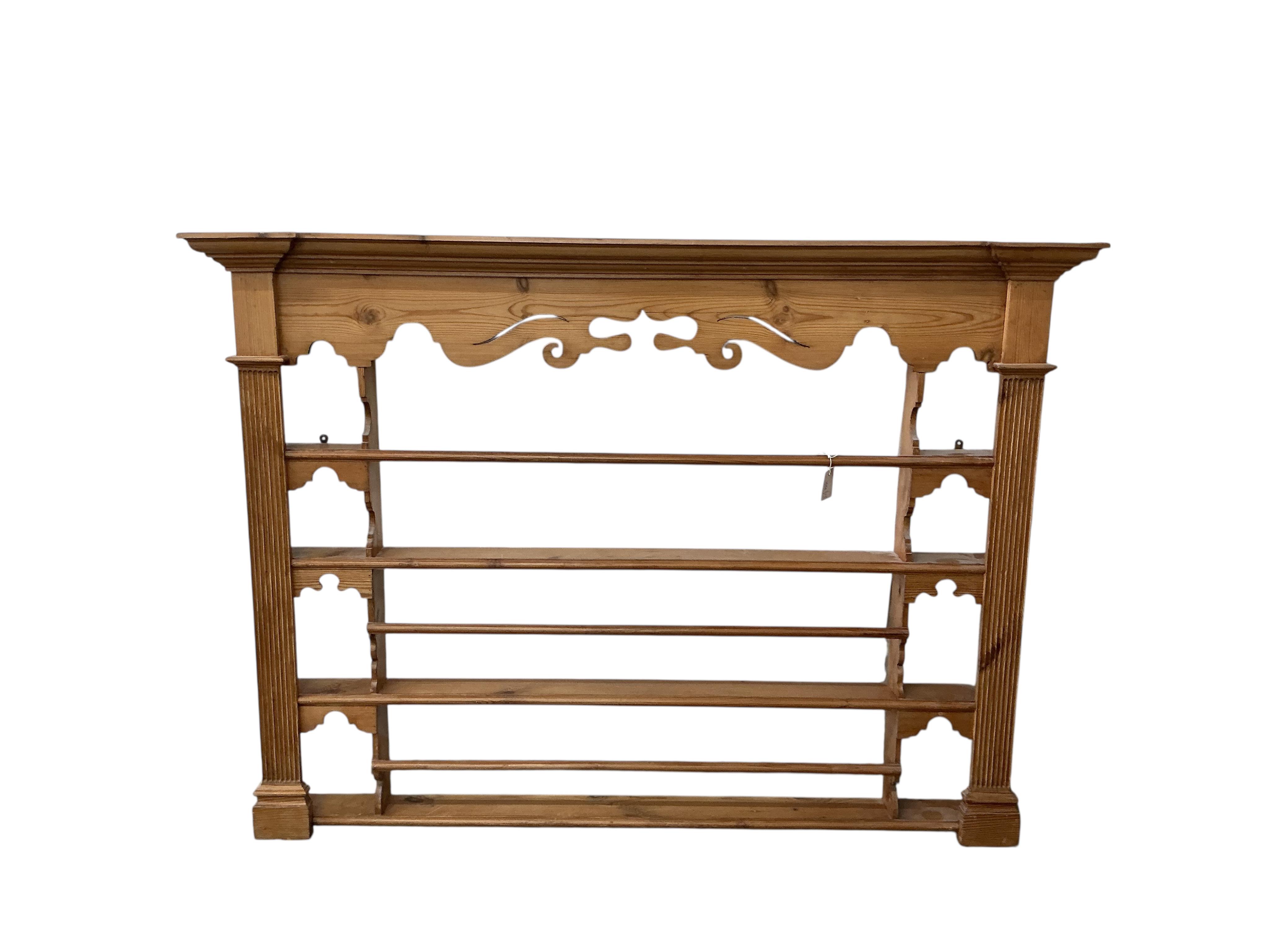 A George III style pine plate rack, width 176cm, height 127cm